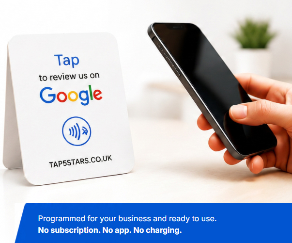 Tap5 Google review card on a counter beside a customer holding a phone